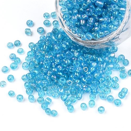 3 mm. turkis, klare, regnbueskinnende glasperler, 50 g = 3,3 m.