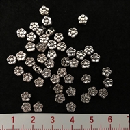 Perle små metal blomster 5 mm.