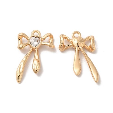 20 forgyldte sløjfer med hvid sten